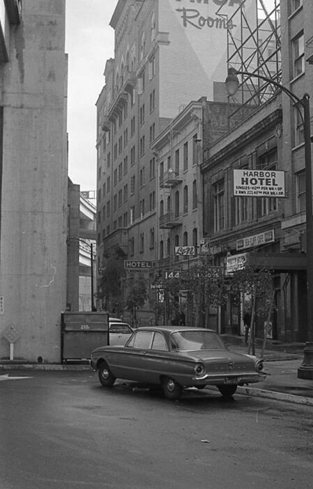 [Hotels and businesses on the 100 block of Embarcadero, including the YMCA and the Embarcadero Freeway]