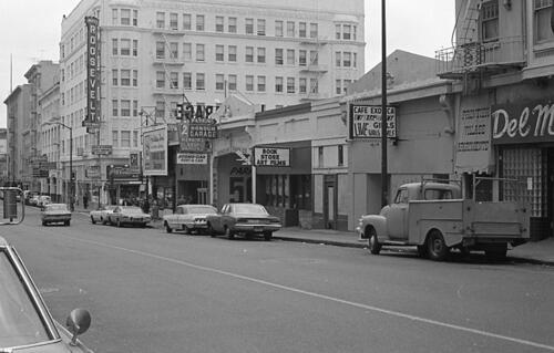 [Honour Garage and Cafe Exotica on Eddy Street, looking toward Jones intersection and Roosevelt Hotel]