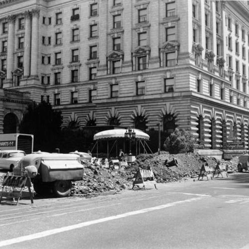 [Fairmont Hotel with road construction in foreground]