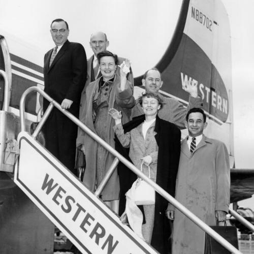 [Attorney General Edmund G. Brown boarding a Western Airlines airplane]