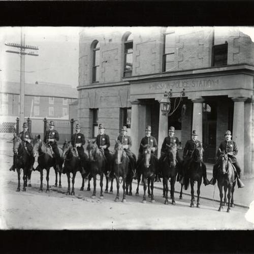 [Policemen on horseback in front of Mission Police Station at 17th and Harrison streets]