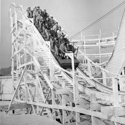 [Group of boys riding the roller coaster at Playland at the Beach]