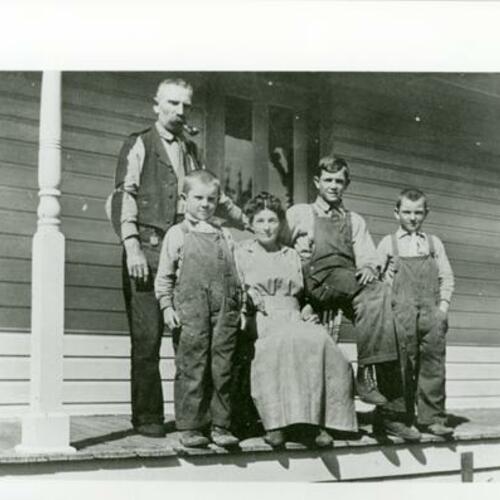 [Judith's family on their front porch at Broad Street]