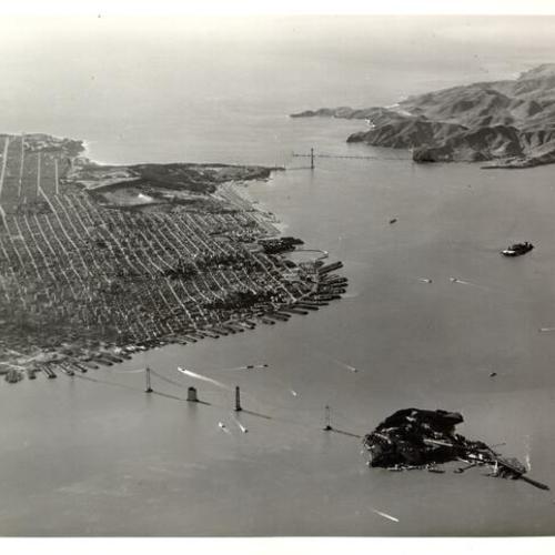 [Aerial view of the bay while San Francisco-Oakland Bay Bridge under construction]