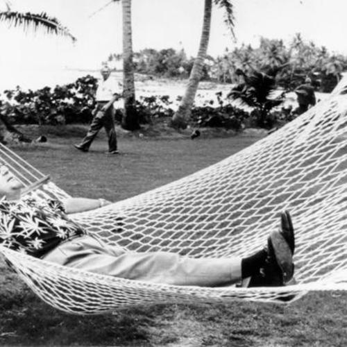 [Governor Edmund G. Brown goes in for some easy living during a break in activities at the U.S. Governors' Conference in Puerto Rico]