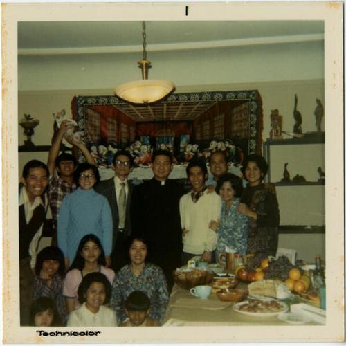 [Family and guests at a home on Clipper Street]