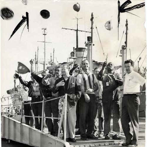 [Workers reacting enthusiastically to news that Hunters Point Shipyard would not be closed]