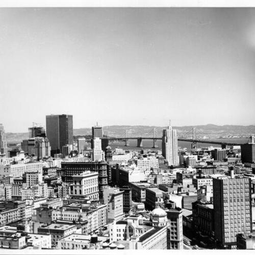 [Aerial view of San Francisco looking across downtown toward the Bay Bridge]