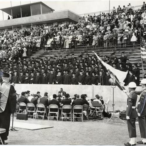 [Commencement ceremony in athletic stadium at City College of San Francisco]