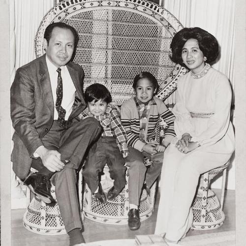 [Shirley's family portrait with her husband and sons]