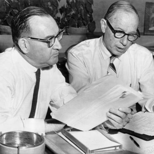 [Governor-elect Edmund Brown works on his inauguration address with Bert W. Levit]