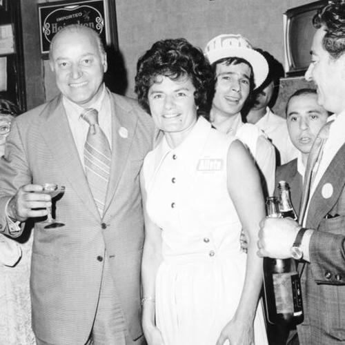 [Joseph Alioto drinks champagne with supporters during campaign for mayor]