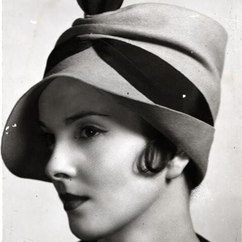 [Woman wearing a Lilly Dache hat]