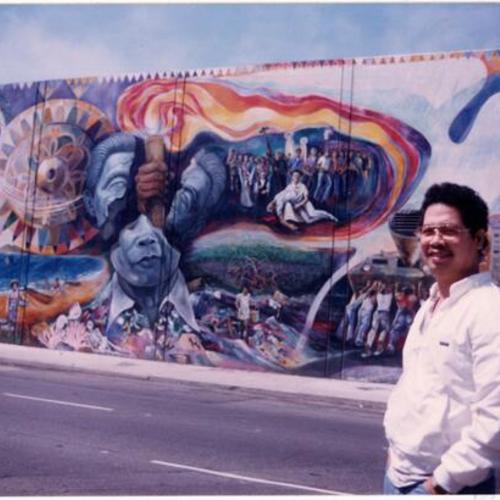 [MC in front of a mural, People Power, at Alemany Boulevard]
