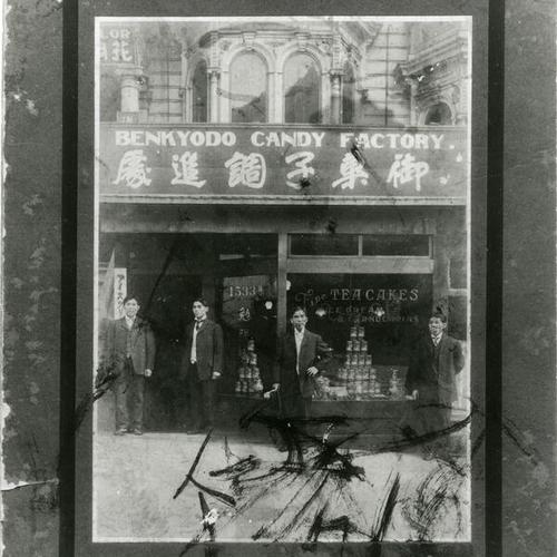 [Exterior of Benkyodo Candy Factory on Geary Boulevard in 1906 with business partners]