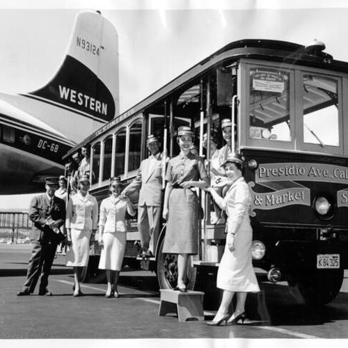 [Judy Rae Wilson, Miss San Francisco 1958, being delivered to the San Francisco International Airport by a California Street cable car]
