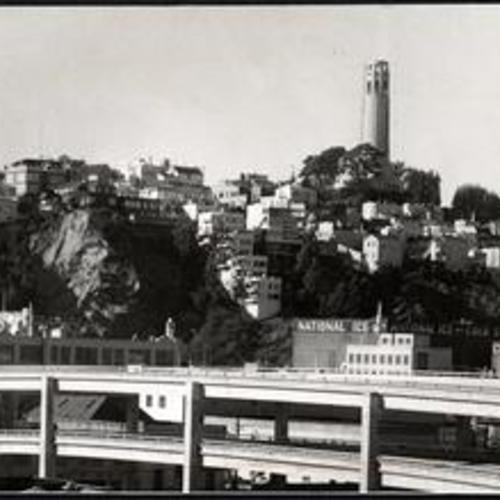[View of Embarcadero Freeway with Telegraph Hill in background]