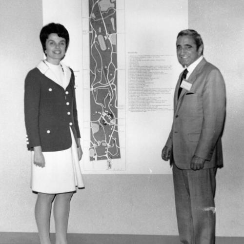 [Diane Feinstein and unidentified man at the Golden Gate Park Centennial final membership meeting]