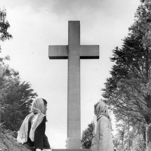 [Janice Corritore and her sister Annette view the cross on top of Mount Davidson]