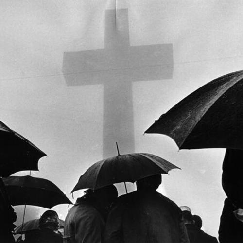 [Worshippers with umbrellas at Easter sunrise services on Mount Davidson]