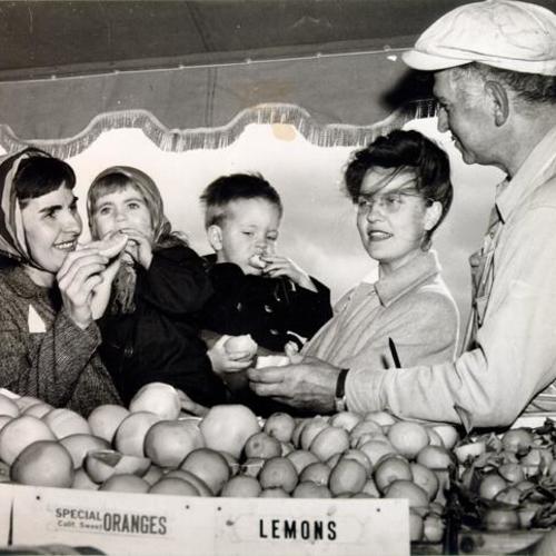 [Marion and Deena Alzofon, Chad and  Alyce Wiepking and Roy Bell at the Farmer's Market on Alemany Boulevard]