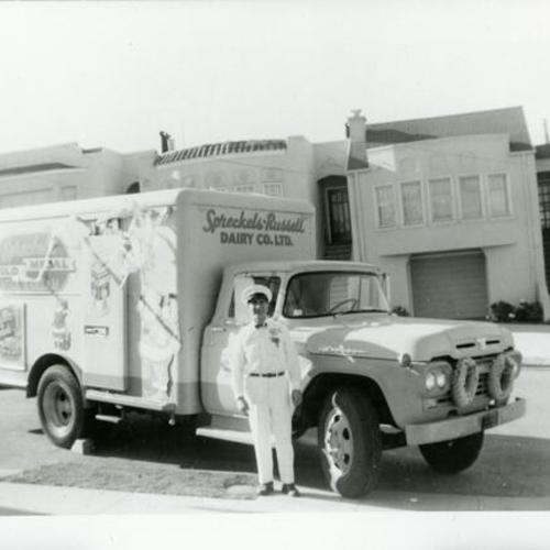 [Charlie's father Angelo on duty driving Spreckels-Russell milk wagon]
