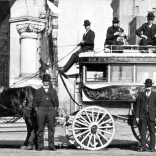 [Unidentified men posing with carriage in front of the Brooklyn Hotel]