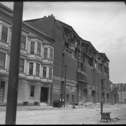 Remains of buildings and rubble at Fillmore Street and Eddy Street after earthquake