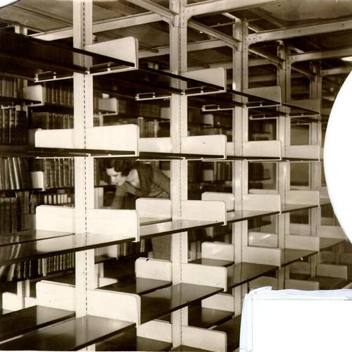 [Empty shelves in Main Library stacks]