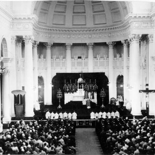 [Interior of St. Ignatius Church during celebration by Father Edward J. Whelan]