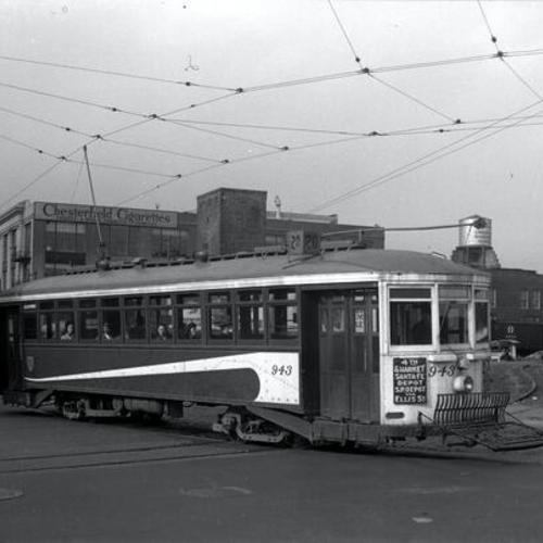[Fourth and Townsend streets looking north at #20 line car 943 turning east onto Townsend]
