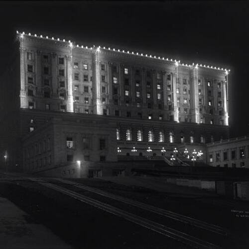 Fairmont Hotel lit up at night during Fleet Week