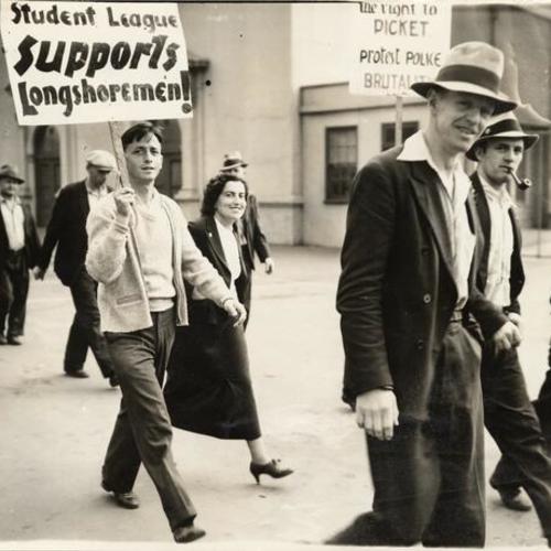 [Longshoremen and supporters marching with picket signs during the strike of 1934]