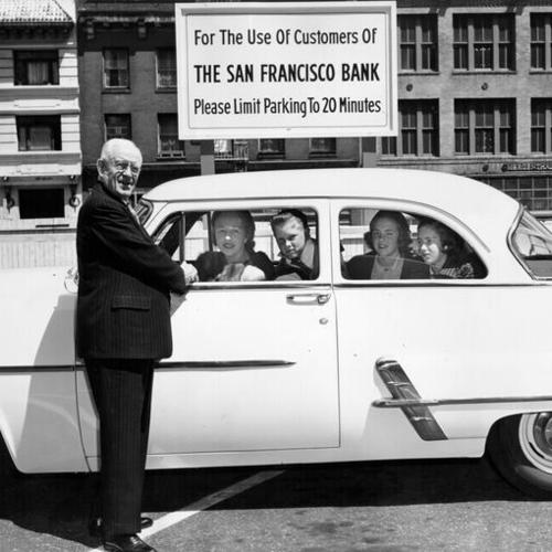 [Parker S. Maddux welcoming the fist customer to the newly installed parking lot at the San Francisco Bank]