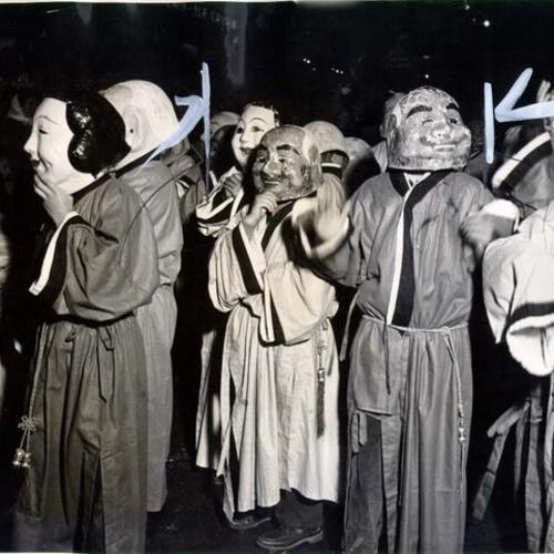 [Chinatown's youngsters wearing opera masks as part of the Portola Parade]