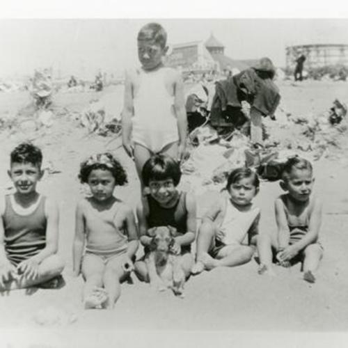 [A family of children at Ocean Beach and Playland in 1937]