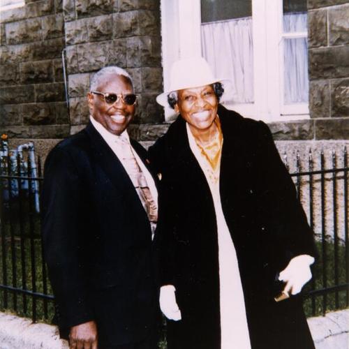 [Freddie and Mabel in front of Philadelphian SDA church on Bush Street on their 50th wedding anniversary in 1995]