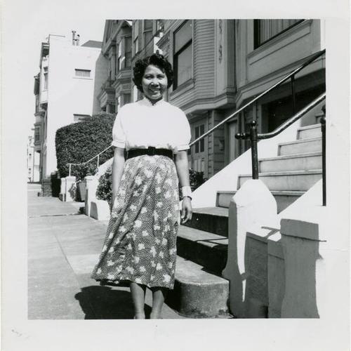 [Grandmother Cecelia is standing in front of her home on Fillmore after the exclusionary housing/zoning laws were removed]