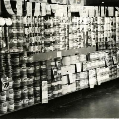 [Canned goods on display at the Crystal Palace Market]