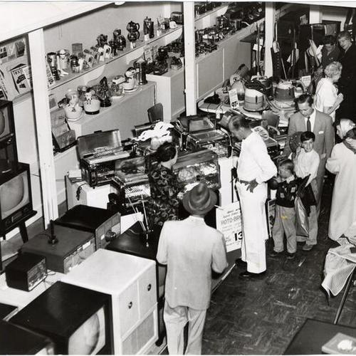 [Customers shopping at Hale's television and appliance store on Mission Street]