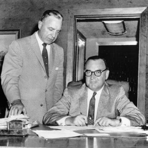 [Governor Edmund G. Brown (seated) signs into law a bill for development of Shelter Cove in Humbolt County as a harbor of refuge]