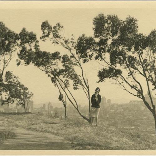 [Unidentified woman standing on Telegraph Hill]