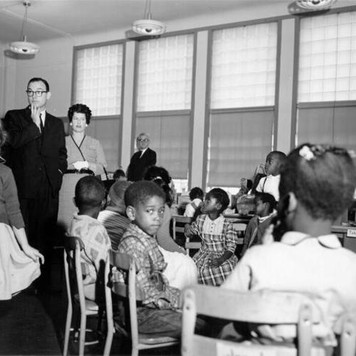 [H. Saltsman, of the Ford Foundation's "Great Cities" project, and Miss T. Kent, from the San Francisco Board of Education, visiting John Swett School]