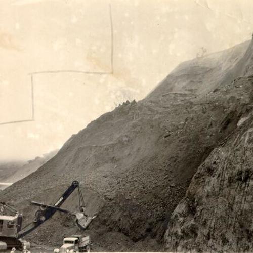 [Crew clearing road after landslide on the Waldo approach to the Golden Gate Bridge]