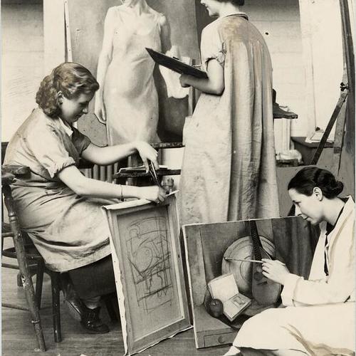 [Three women working on paintings at the California School of Fine Arts]
