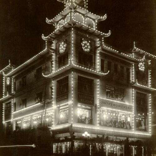 [Building on Grant Avenue in Chinatown illuminated for the Portola Festival, October 19-23, 1909]