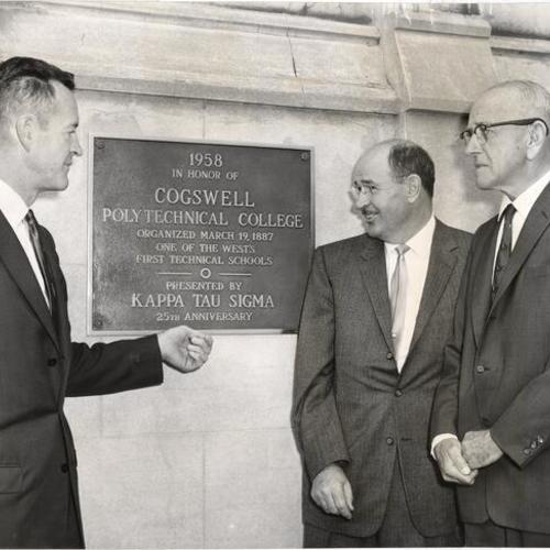 [Lyle Patton, Eugene Wood Smith and Francis T. Letchfield standing next to a memorial plaque honoring Cogswell Polytechnical College]