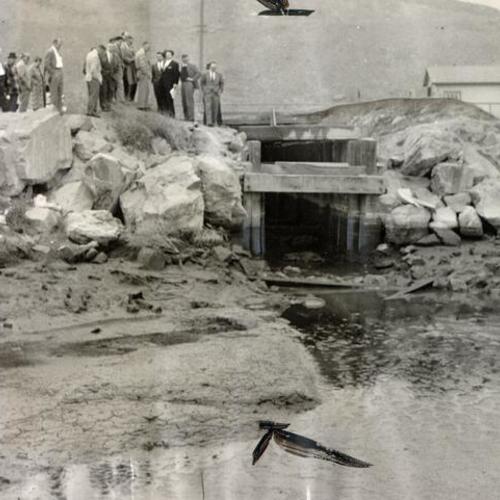 [Group of legislators and assemblymen inspecting the smell emanating from Candlestick Park's Cove]