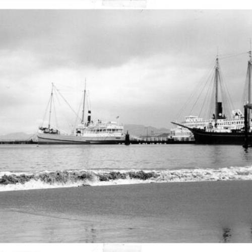 [View, from the shore,of ships docked at the Hyde Street Pier]