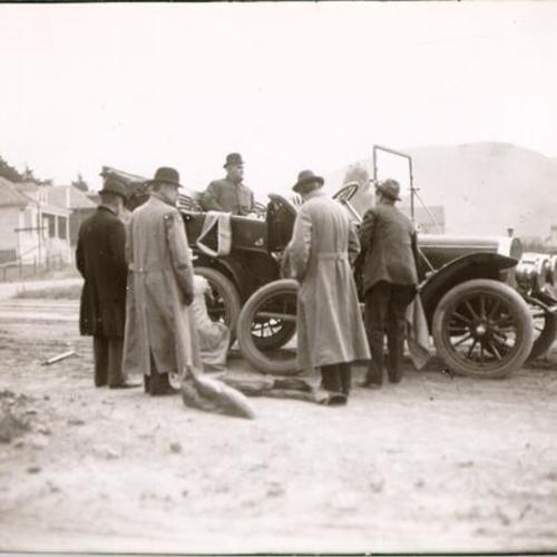 [Group of unidentified men with an automobile]